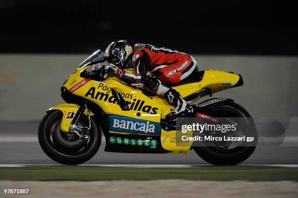 Hector Barbera of Spain and Team Aspar heads down a straight during the third day of testing at Losail Circuit on March 19, 2010 in Doha, Qatar.