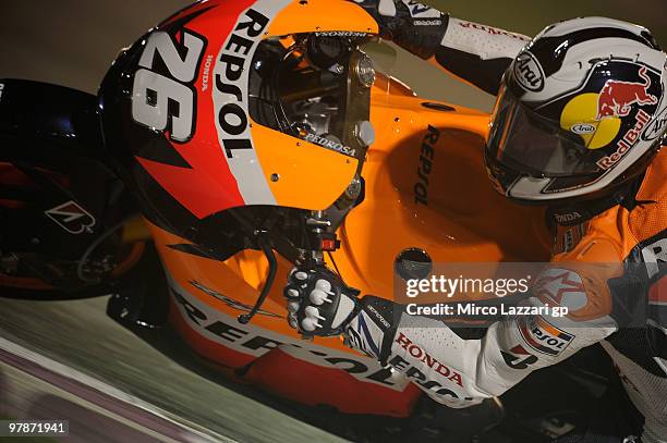 Dani Pedrosa of Spain and Repsol Honda Team rounds the bend during the third day of testing at Losail Circuit on March 19, 2010 in Doha, Qatar.