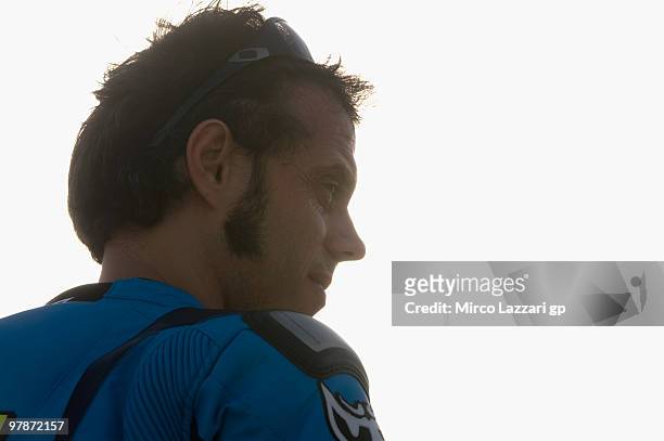 Loris Capirossi of Italy and Rizla Suzuki MotoGP looks on during the third day of testing at Losail Circuit on March 19, 2010 in Doha, Qatar.