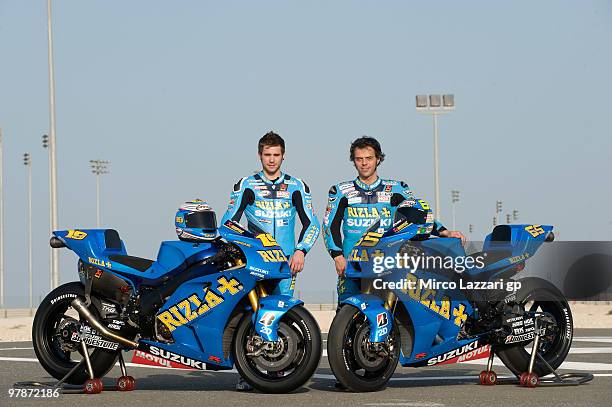 Alvaro Bautista of Spain and Loris Capirossi of Italy and Rizla Suzuki MotoGP poses with his bike during the third day of testing at Losail Circuit...