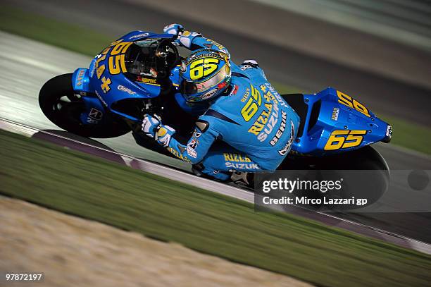 Loris Capirossi of Italy and Rizla Suzuki MotoGP rounds the bend during the third day of testing at Losail Circuit on March 19, 2010 in Doha, Qatar.