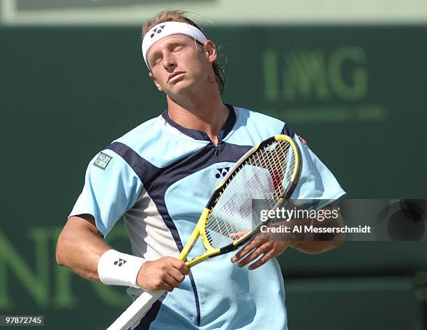 David Nalbandian reacts to a lost point and falls to Ivan Ljubicic 6 - 1 6- 2 in the men's semi-finals at the 2006 NASDAQ 100 Open at Key Biscayne,...