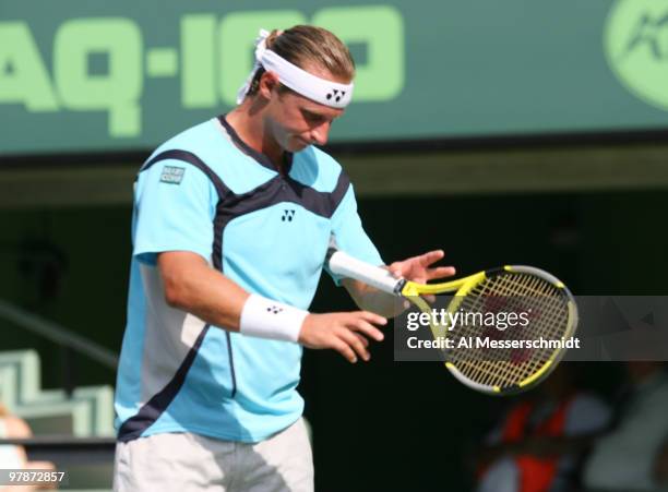 David Nalbandian tosses his racquet and falls to Ivan Ljubicic 6 - 1 6- 2 in the men's semifinals at the 2006 NASDAQ-100 Open at Key Biscayne,...