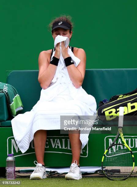 Johanna Konta of Great Britain reacts during her first round match against Petra Kvitova of The Czech Rupublic on Day Four of the Nature Valley...