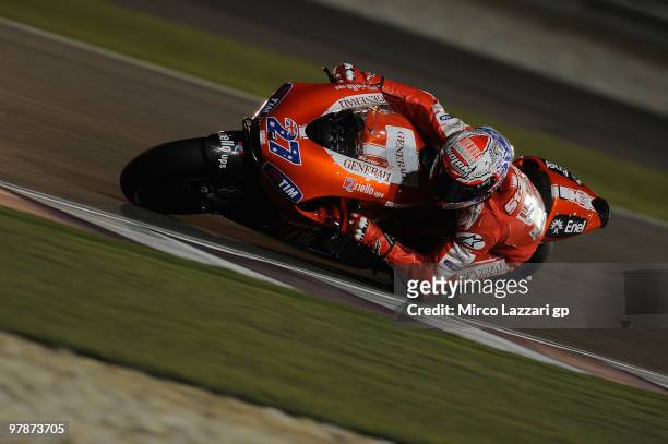 Casey Stoner of Australia and Ducati Marlboro Team rounds the bend during the third day of testing at Losail Circuit on March 19, 2010 in Doha, Qatar.