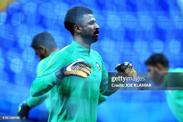 Saudi Arabia's goalkeeper Mohammed Al-Owais takes part in a training session at the Rostov Arena in Rostov-On-Don on June 19 on the eve of the Russia...
