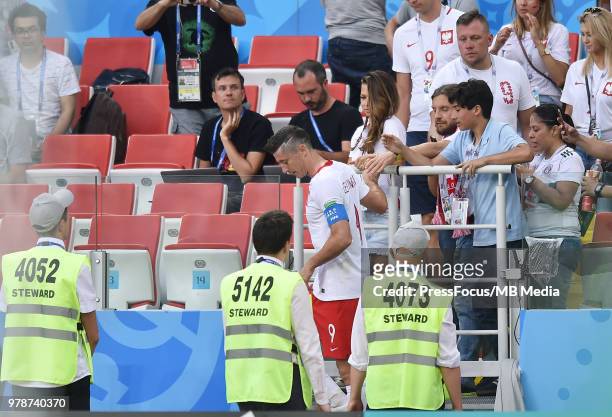 Robert Lewandowski of Poland after the match with his wife Anna Lewandowski during the 2018 FIFA World Cup Russia group H match between Poland and...
