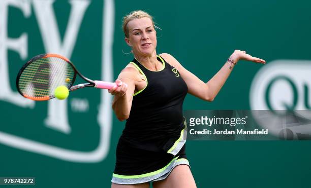 Anastasia Pavlyuchenkova of Russia plays a forehand during her first round match against Garbine Muguruza of Spain on Day Four of the Nature Valley...