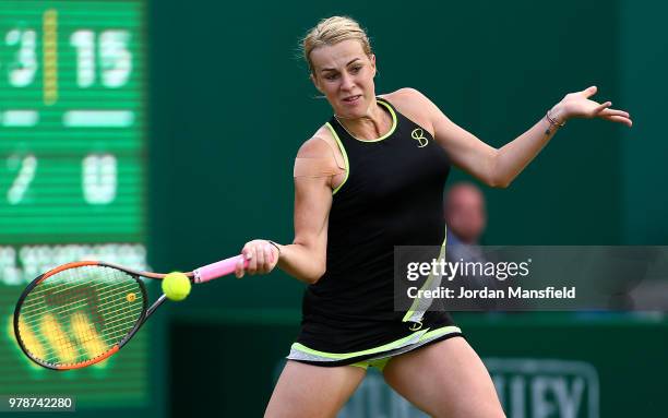 Anastasia Pavlyuchenkova of Russia plays a forehand during her first round match against Garbine Muguruza of Spain on Day Four of the Nature Valley...