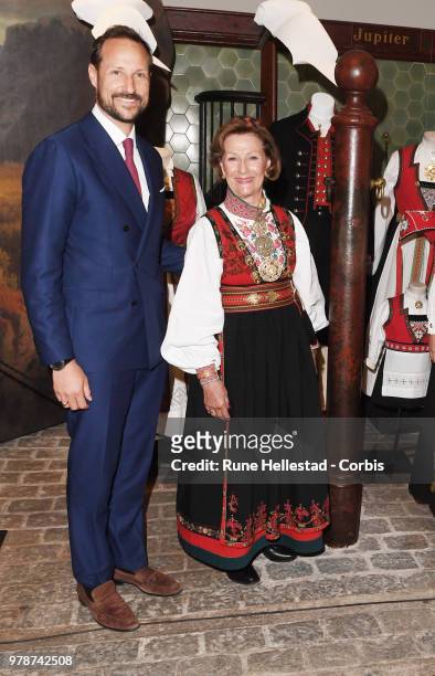 Crown Prince Haakon and Queen Sonja are seen during the opening of the exhibition 'Tradition And Inspiration. National Heritage In The Royal...