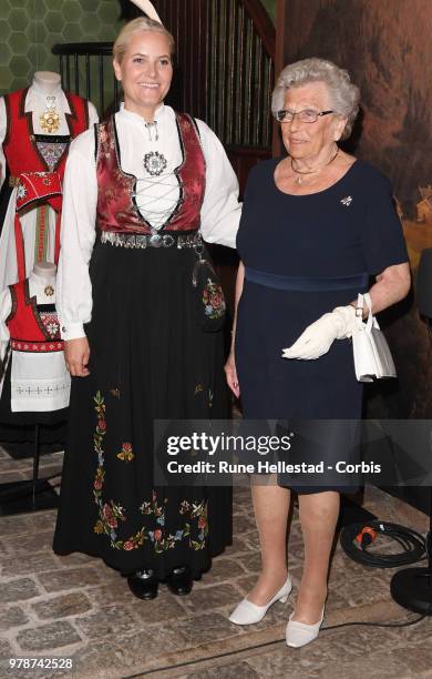 Crown Princess Mette- Marit and Princess Astrid Fru Ferner are seen during the opening of the exhibition 'Tradition And Inspiration. National...