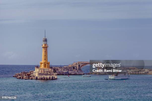 pharos of alexandria against clear sky, alexandria, egypt - alexandria egypt fotografías e imágenes de stock