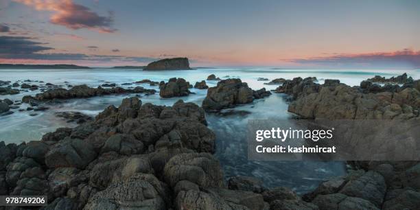 rocks in minnamurra river, kiama, new south wales - kiama bildbanksfoton och bilder