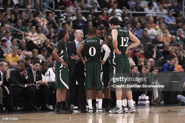 Playoffs: Ohio University head coach John Groce with team in huddle during game vs Georgetown. Providence, RI 3/18/2010 CREDIT: Damian Strohmeyer