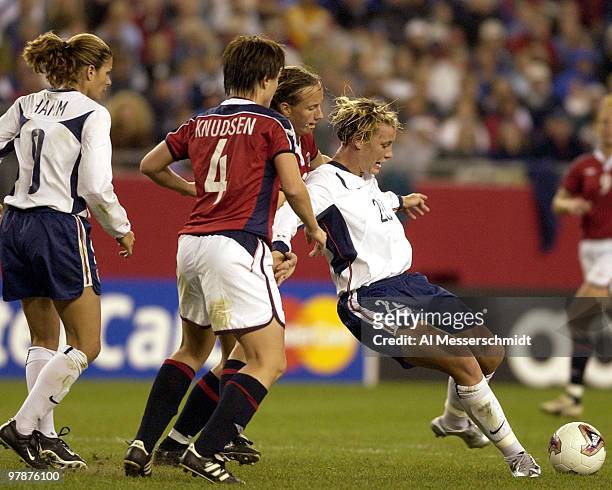United States forward Abby Wambach - who scored the game-winning goal - leans for a shot on goal October 1, 2003 at Gillette Stadium, Foxboro,...