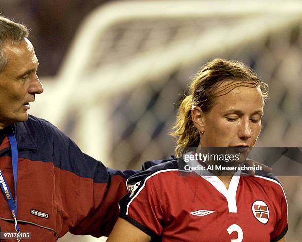Norway defender Ane Stangeland leaves the pitch with an injury October 1, 2003 at Gillette Stadium, Foxboro, Massachuttes, during the quarterfinals...