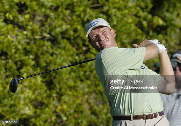 Ernie Els tees off on the 18th hole at Waialae Country Club Sunday, January 18, 2004 at the Sony Open in Hawaii. Els won the tournament after three...