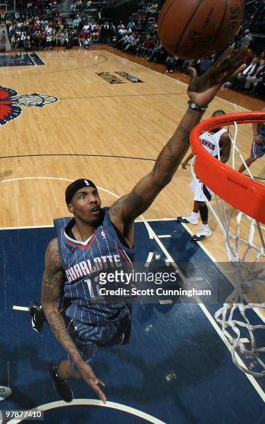 Tyrus Thomas of the Charlotte Bobcats puts up a shot against the Atlanta Hawks on March 19, 2010 at Philips Arena in Atlanta, Georgia. NOTE TO USER:...