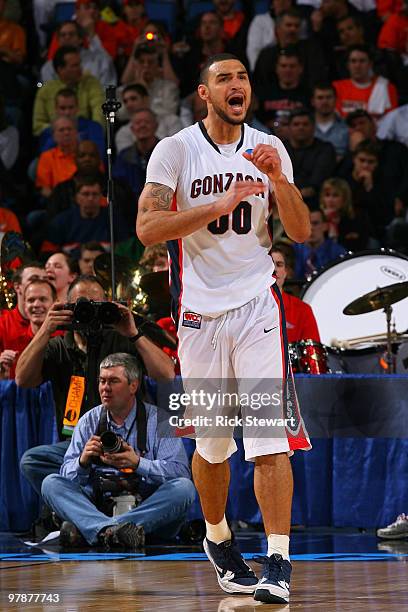 Robert Sacre of the Gonzaga Bulldogs reacts after a play against the Florida State Seminoles during the first round of the 2010 NCAA men's basketball...