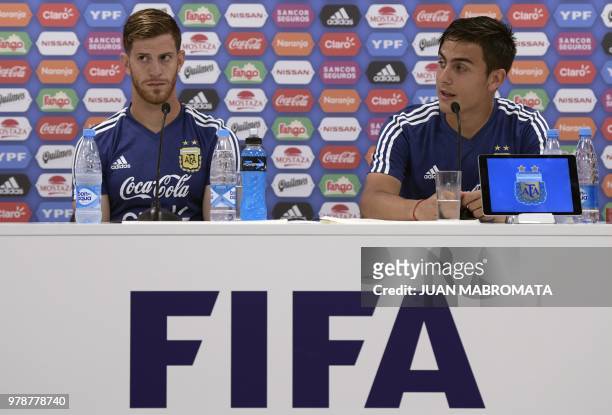 Argentina's forward Paulo Dybala and defender Cristian Ansaldi hold a press conference at the team's base camp in Bronnitsy, near Moscow on June 19...