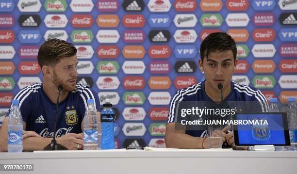 Argentina's forward Paulo Dybala and defender Cristian Ansaldi hold a press conference at the team's base camp in Bronnitsy, near Moscow on June 19...