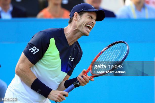 Andy Murray of Great Britain reacts during his defeat to Nick Kyrgios of Australia during Day 2 of the Fever-Tree Championships at Queens Club on...