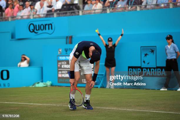 Andy Murray of Great Britain reacts during his defeat to Nick Kyrgios of Australia during Day 2 of the Fever-Tree Championships at Queens Club on...