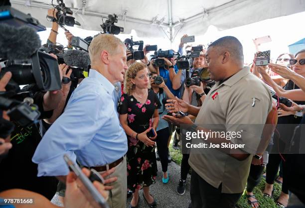 Sen. Bill Nelson , left, and U.S. Rep. Debbie Wasserman Schultz , center, are denied access as they attempted to visit the Homestead Temporary...