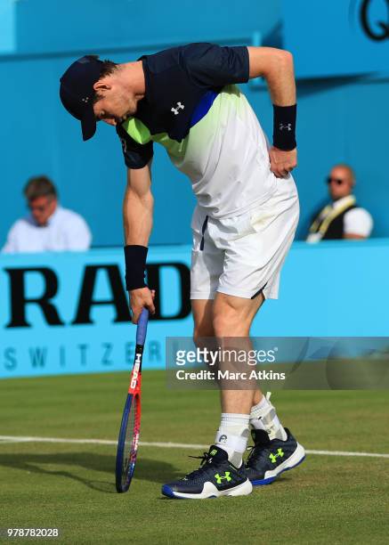 Andy Murray of Great Britain reacts during his defeat to Nick Kyrgios of Australia during Day 2 of the Fever-Tree Championships at Queens Club on...