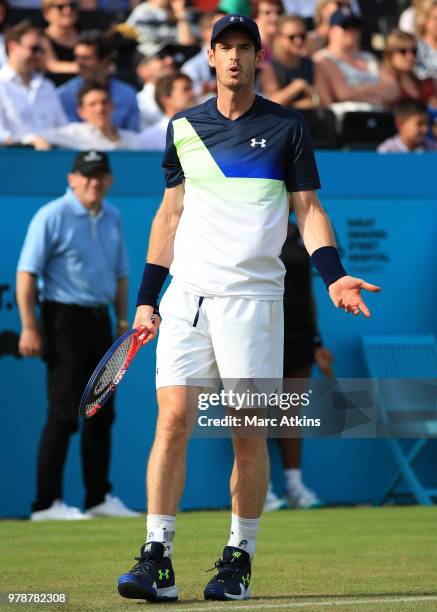 Andy Murray of Great Britain reacts during his defeat to Nick Kyrgios of Australia during Day 2 of the Fever-Tree Championships at Queens Club on...