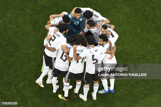 Egypt's players gather in a huddle during the Russia 2018 World Cup Group A football match between Russia and Egypt at the Saint Petersburg Stadium...