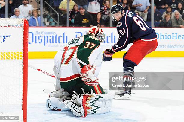 Rick Nash of the Columbus Blue Jackets beats goaltender Josh Harding of the Minnesota Wild for the game winning goal during the third period on March...