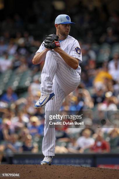 Adrian Houser of the Milwaukee Brewers pitches in the ninth inning against the Philadelphia Phillies at Miller Park on June 17, 2018 in Milwaukee,...