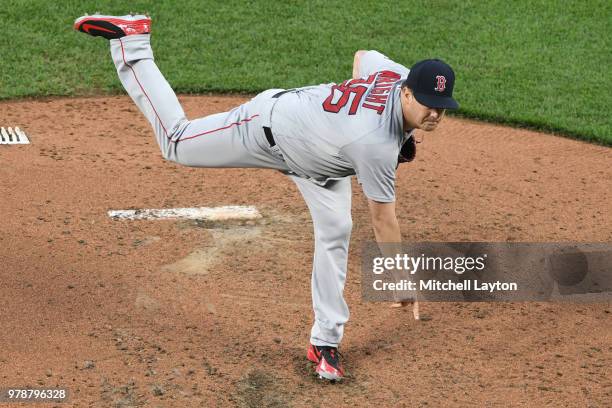 Steven Wright of the Boston Red Sox pitches during a baseball game against the Baltimore Orioles at Oriole Park at Camden Yards on June 11, 2018 in...