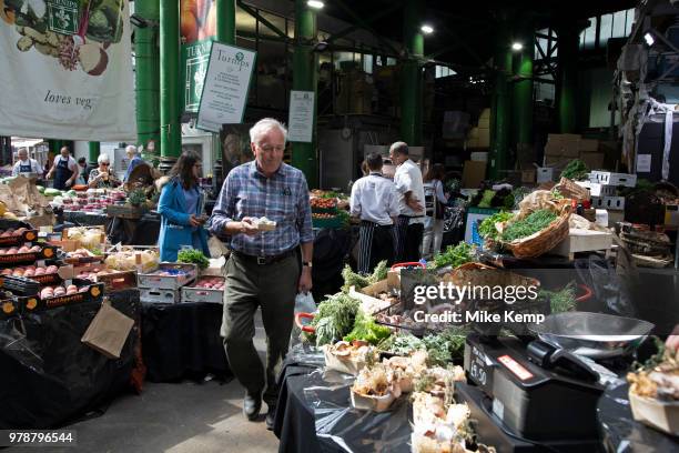 Turnips fruit and veg seller at Borough Market in London, England, United Kingdom. Borough Market is a retail food market and farmers market in...