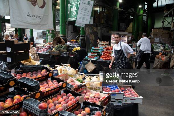 Turnips fruit and veg seller at Borough Market in London, England, United Kingdom. Borough Market is a retail food market and farmers market in...