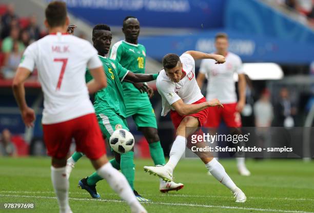 Robert Lewandowski of Poland Gana Idrissa Gueye of Senegal during the 2018 FIFA World Cup Russia group H match between Poland and Senegal at Spartak...