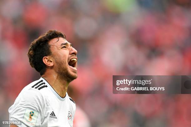 Egypt's forward Mahmoud 'Trezeguet' Hassan reacts during the Russia 2018 World Cup Group A football match between Russia and Egypt at the Saint...