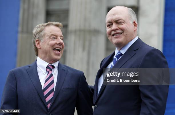 Bill Ford, executive chairman of Ford Motor Co., left, and Jim Hackett, president and chief executive officer of Ford Motor Co., stand for a...