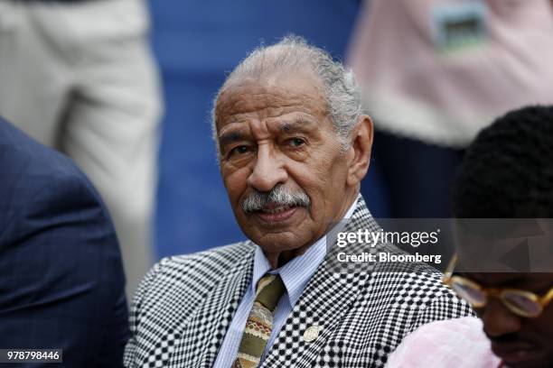 Representative John Conyers, a Democrat from Michigan, listens during a Ford Motor Co. Event at the Michigan Central Station in the Corktown...