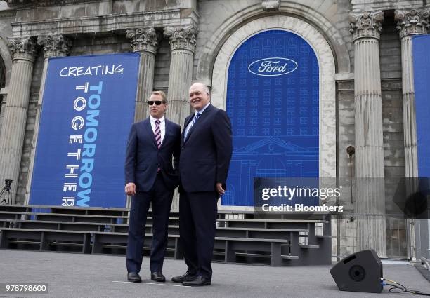 Bill Ford, executive chairman of Ford Motor Co., left, and Jim Hackett, president and chief executive officer of Ford Motor Co., stand for a...