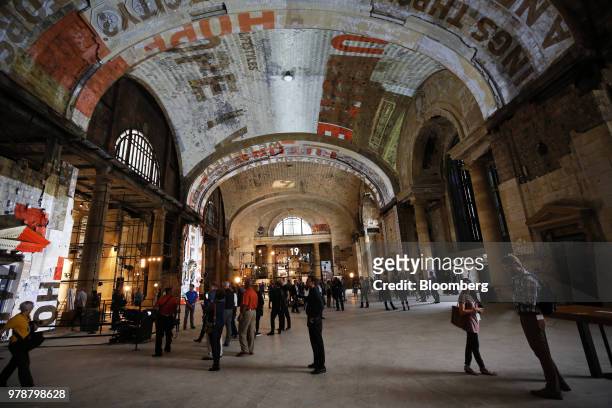 Attendees view the interior of the Michigan Central Station during a Ford Motor Co. Event in the Corktown neighborhood of Detroit, Michigan, U.S., on...