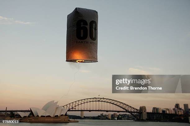 Seven lanterns to represent the seven continents of the world are released over Sydney Harbour to launch the one week countdown to Earth Hour, at...