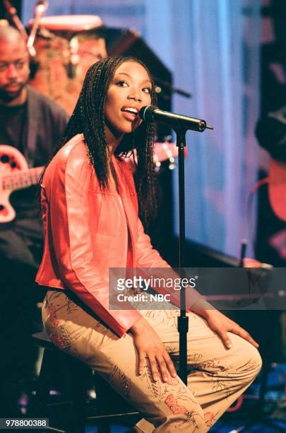 Episode 1604 -- Pictured: Musical guest Brandy performs on May 13, 1999 --