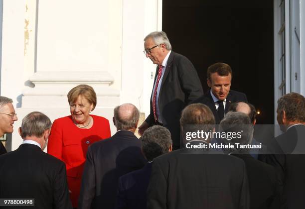 German Chancellor Angela Merkel, French President Emmanuel Macron and EU commission president Jean-Claude Juncker welcome representatives of German...