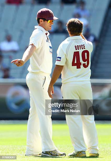 Chris Simpson of the Bulls chats with Cameron Boyce during day four of the Sheffield Shield Final between the Victorian Bushrangers and the...