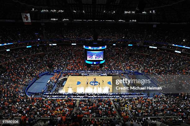 The Vermont Catamounts tip the ball off against the Syracuse Orange to start their game during the first round of the 2010 NCAA men's basketball...