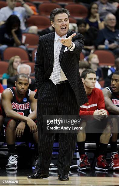 Rick Pitino head coach of the Louisville Cardinals intructs his team against the California Golden Bears during the first round of the 2010 NCAA...
