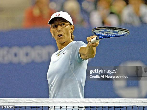 Martina Navratilova and Leander Paes win a quarter final mixed doubles match September 6, 2004 at the 2004 US Open in New York.