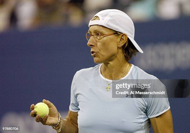 Martina Navratilova and Leander Paes win a quarter final mixed doubles match September 6, 2004 at the 2004 US Open in New York.